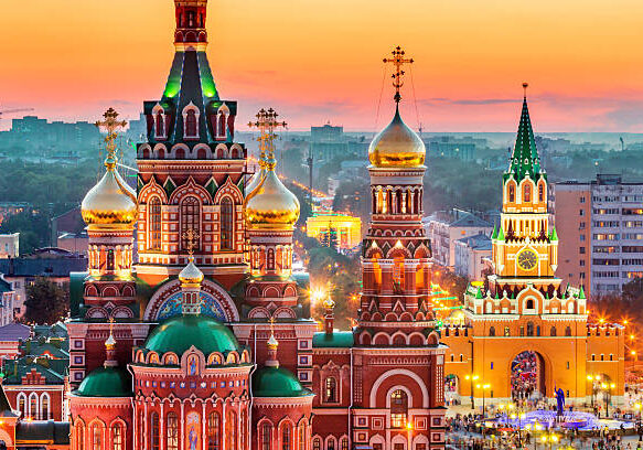 istockphoto-586391832-612x612 Nice view of the town at sunset. Orthodox church surrounded by beautiful red brick buildings on the city's embankment. Volga region of Russia, the city of Yoshkar-Ola